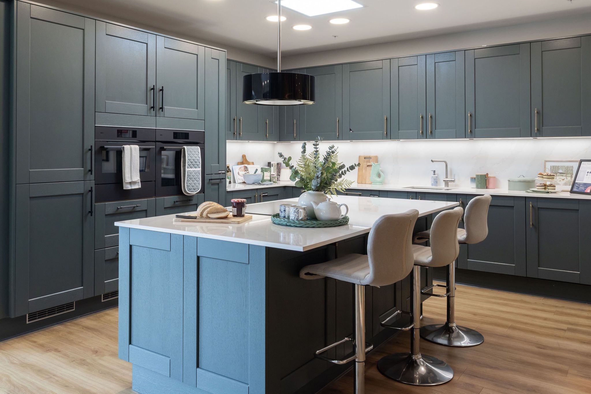 Showroom kitchen with Maine Heritage Green shaker doors