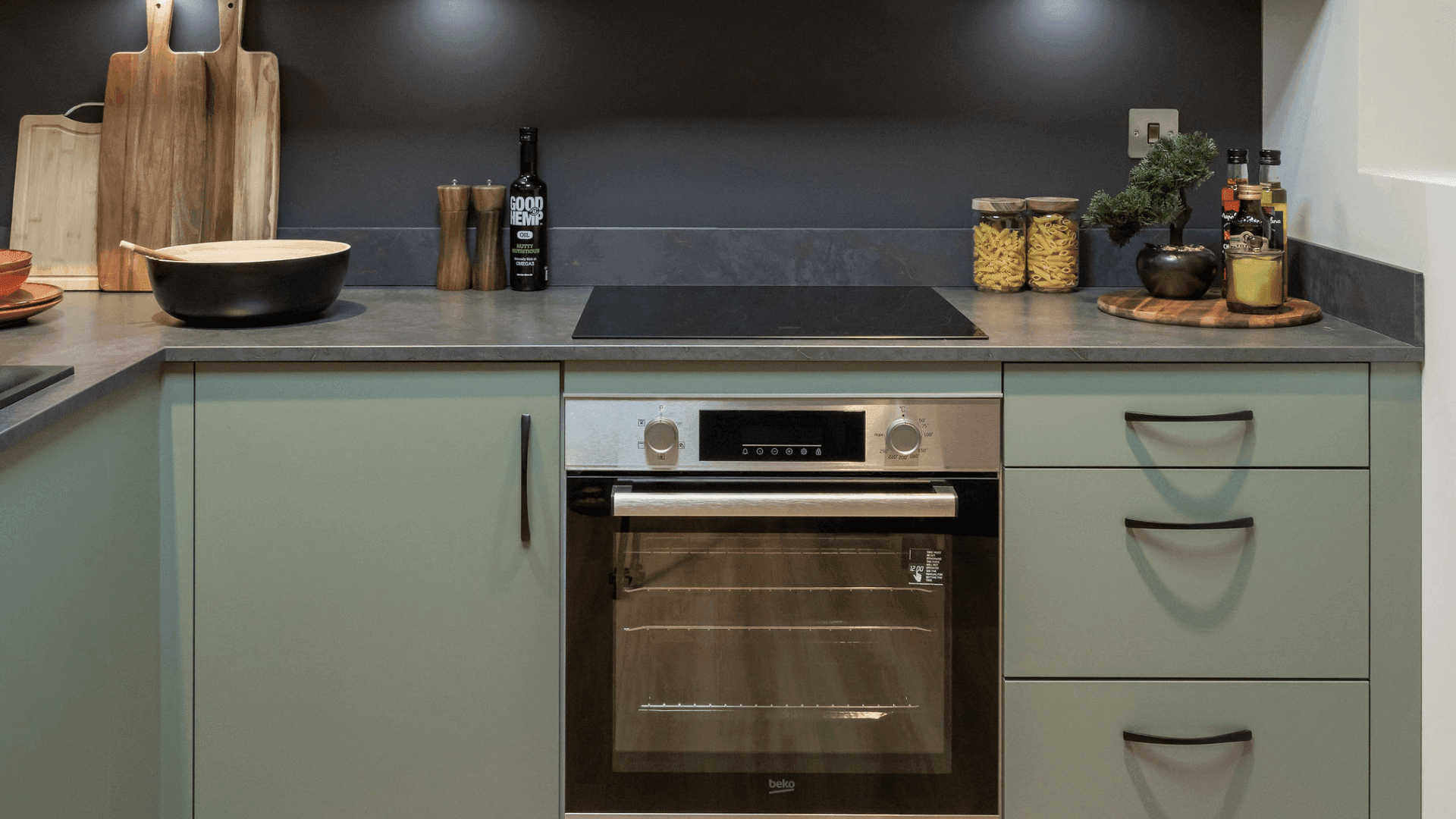 Kitchen with Franklin Reed Green doors and matt black handles