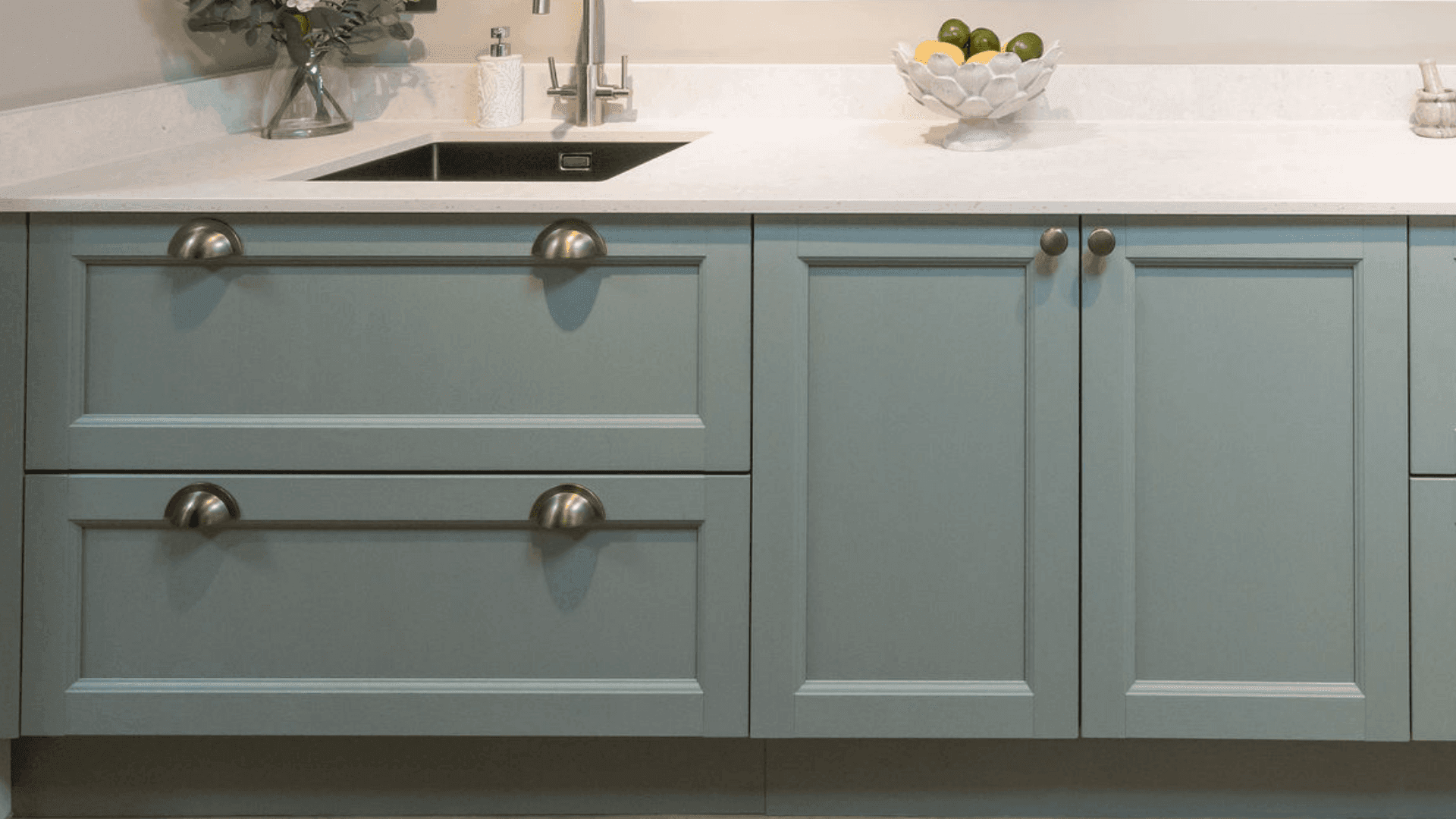 Kitchen with Arundel Reed Green doors and traditional cup and knob handles