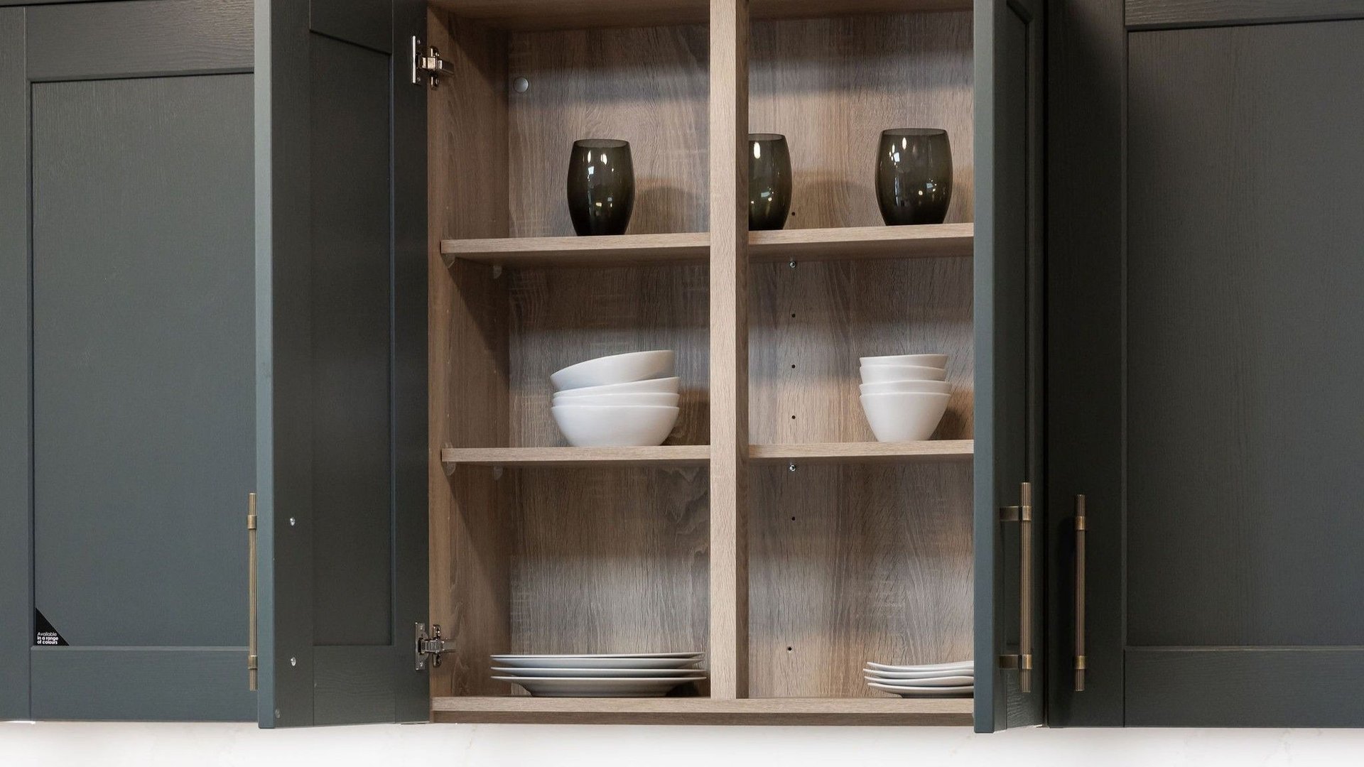 Wall unit with doors open showing cabinetry