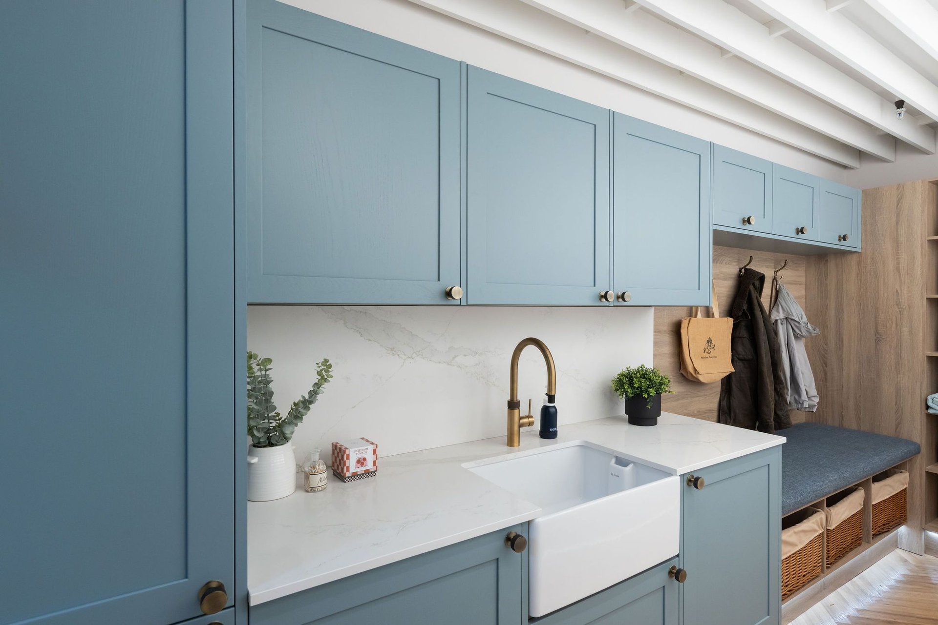 Utility with Fishbourne Light Teal shaker doors and belfast sink