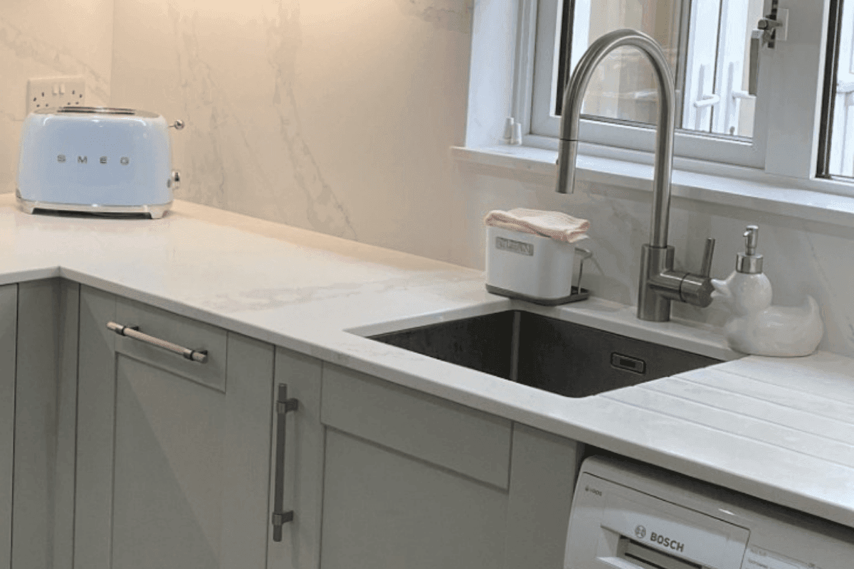 Dove Grey shaker kitchen with fluted handles
