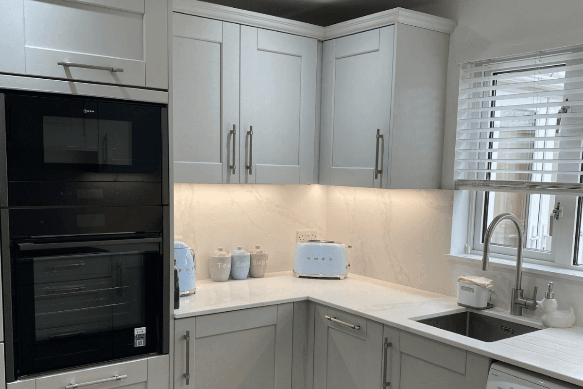 Dove Grey shaker kitchen with fluted handles