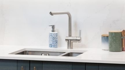 Kitchen with undermount sink and tap