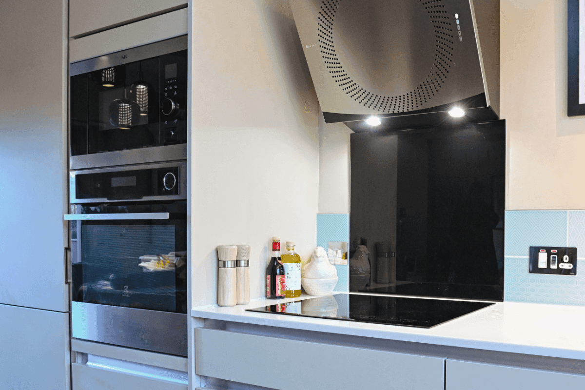Handleless matt cashmere kitchen with integrated appliances