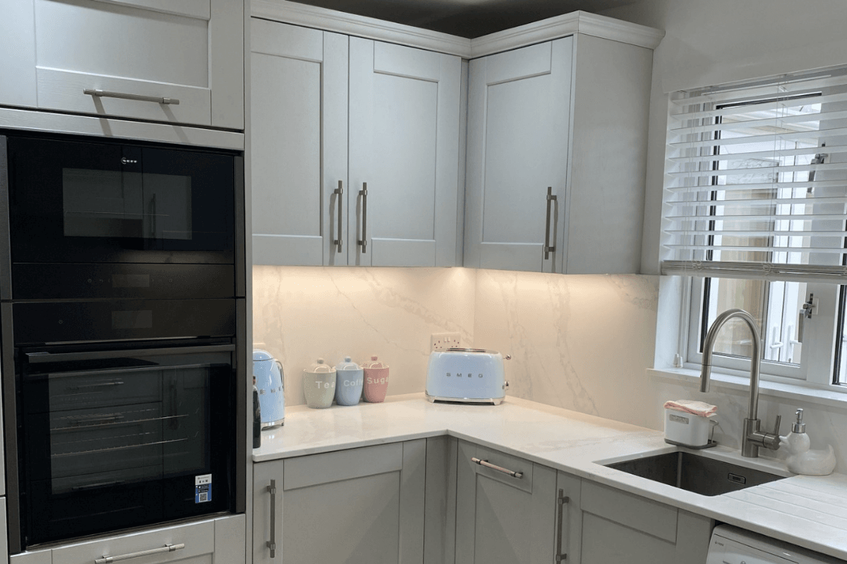 Dove Grey shaker kitchen with fluted handles